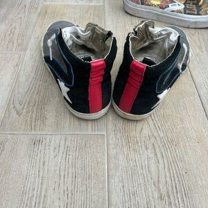 Golden Goose Women’s  Black Suede High-Top Sneakers with Red Heel Stripe